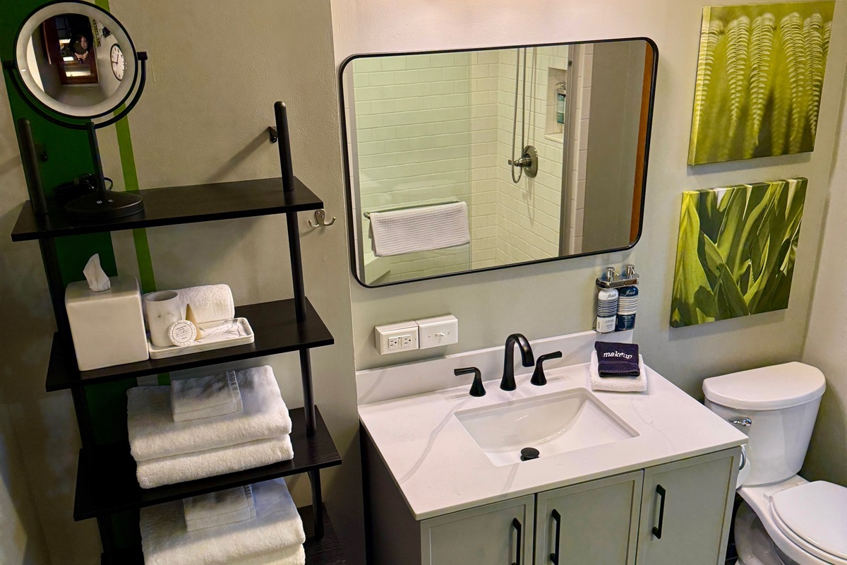 The large bathroom is stocked with everything you need.