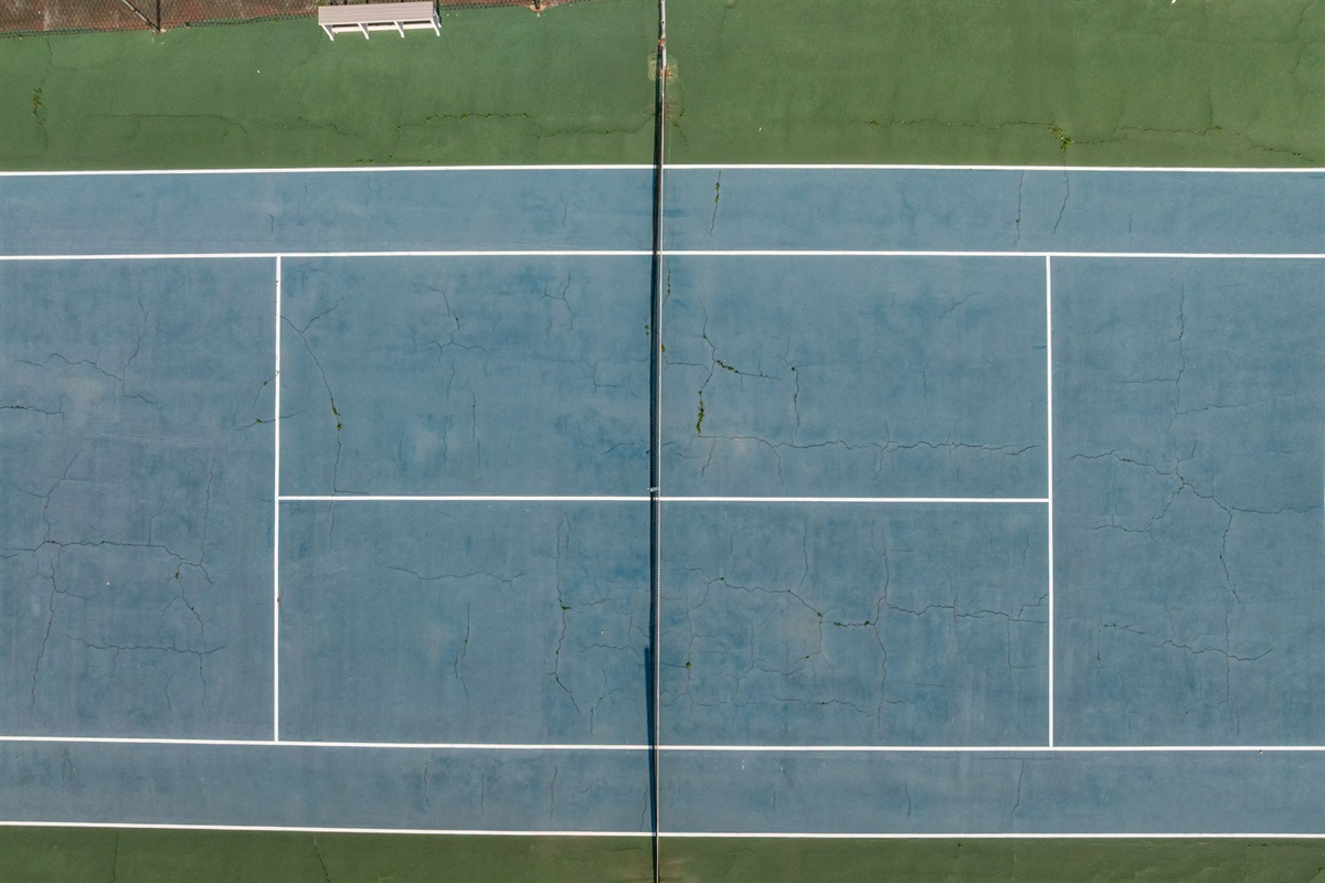 Community tennis court available for guests who want to stay active during their stay