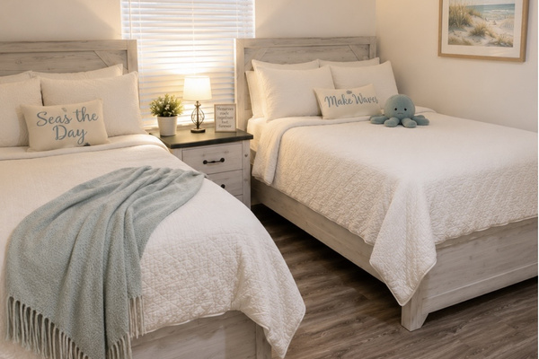 A serene bedroom with soft bedding and natural touches creates a calm, restful retreat at the end of each day. ⭐