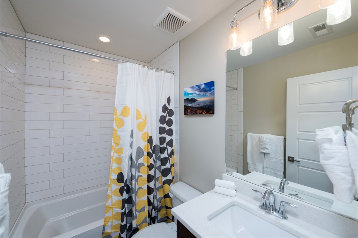 Clean, modern hall bathroom with everything you need