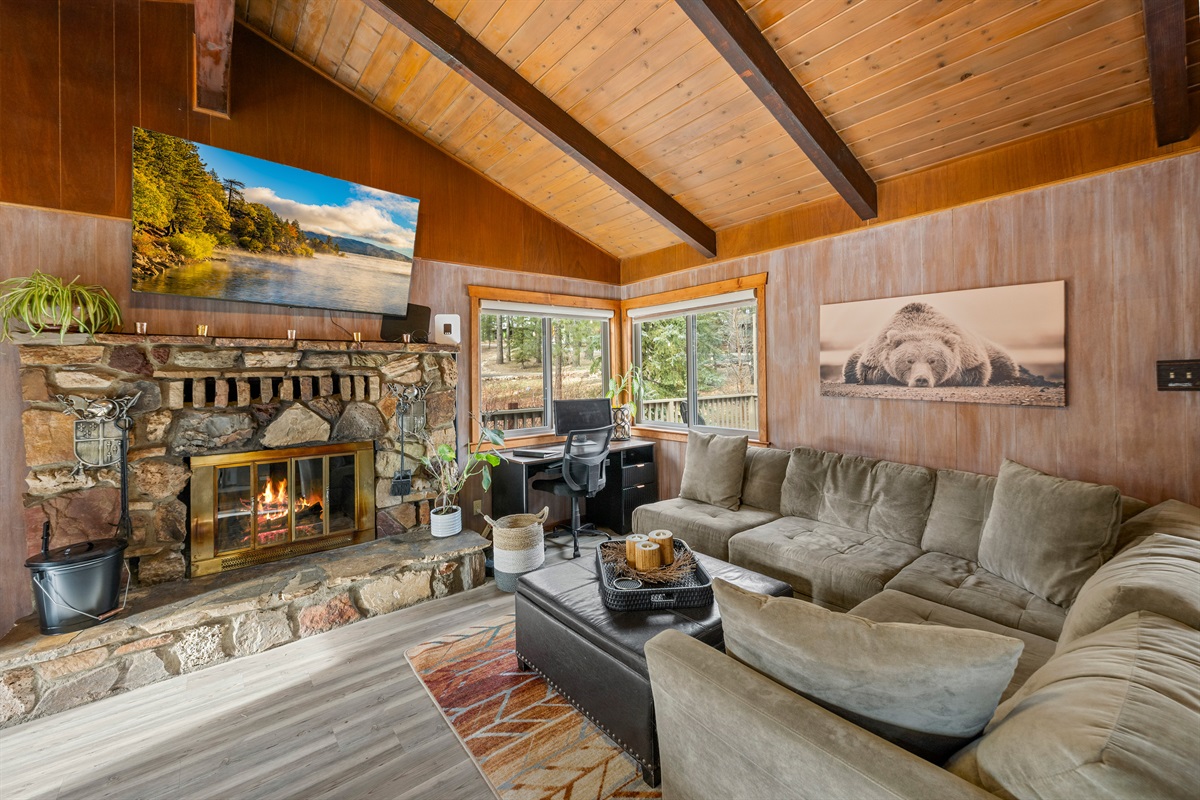 Where rustic charm meets snack-seeking adventures—pull up a stool, warm your toes by the fire, and pretend you’re in your own cabin-themed sitcom.  