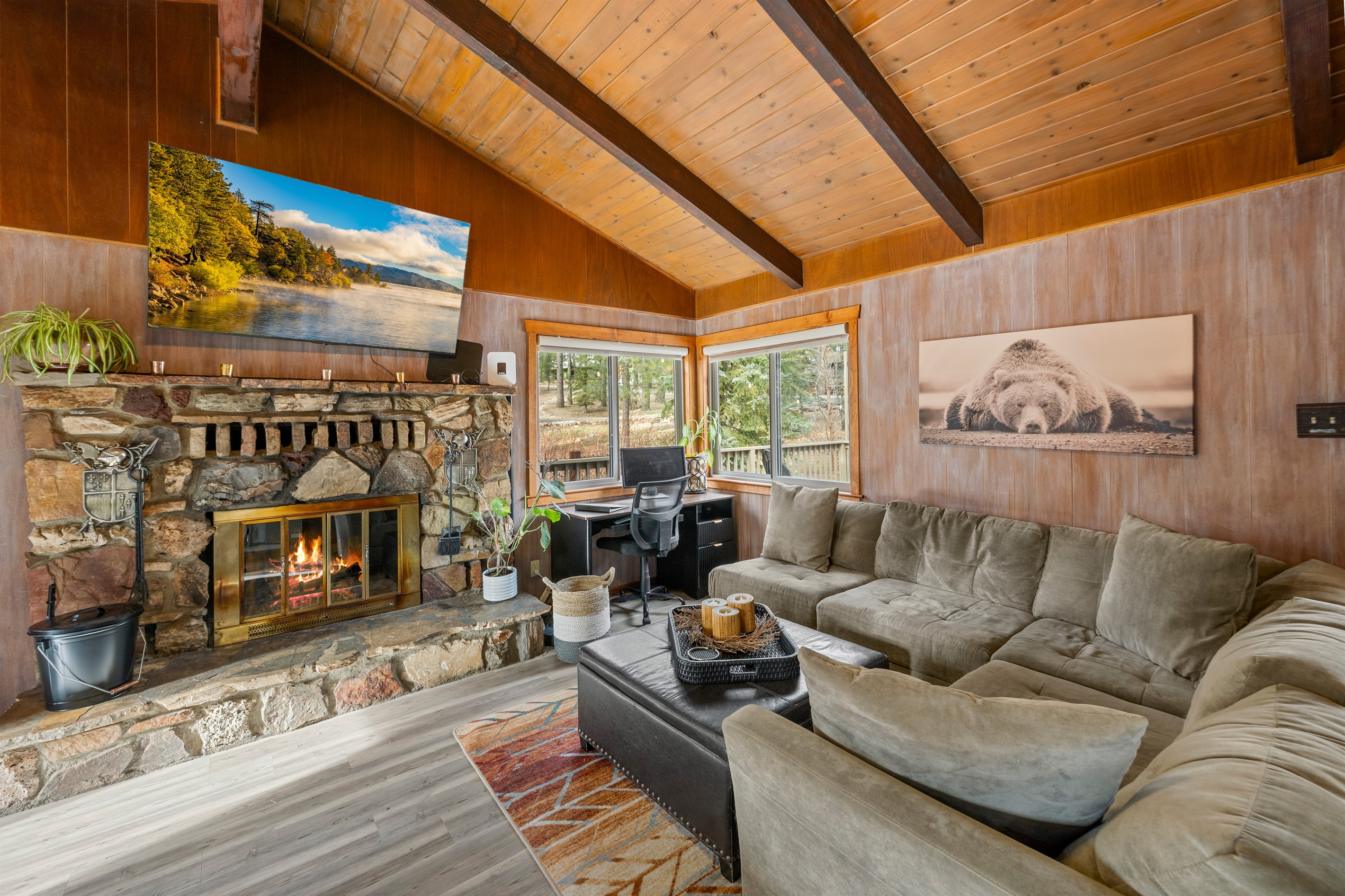 Where rustic charm meets snack-seeking adventures—pull up a stool, warm your toes by the fire, and pretend you’re in your own cabin-themed sitcom.  