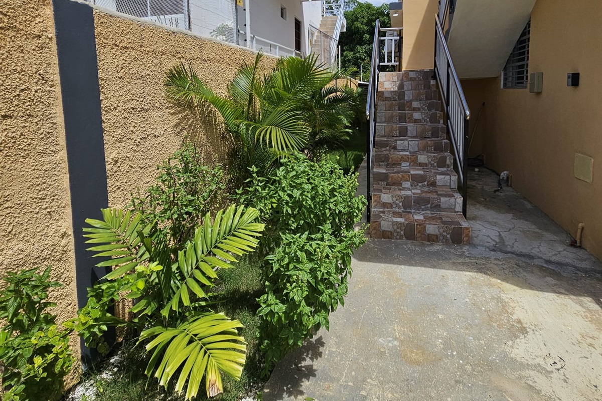 Stairs to 4 bedroom accomodation