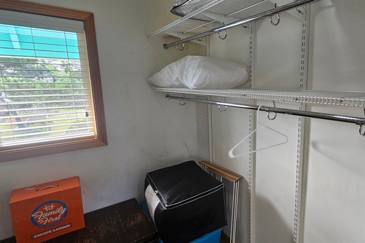shelves on both sides in upstairs walk in closet