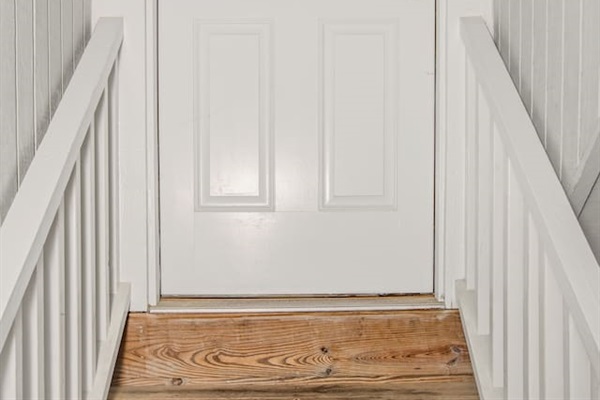 Enter from convenient parking under the house. Use your own unique entry code in this keyless entry door.  (Four cars only under house.  No more.  There is public parking close by in Calhoun Street.)