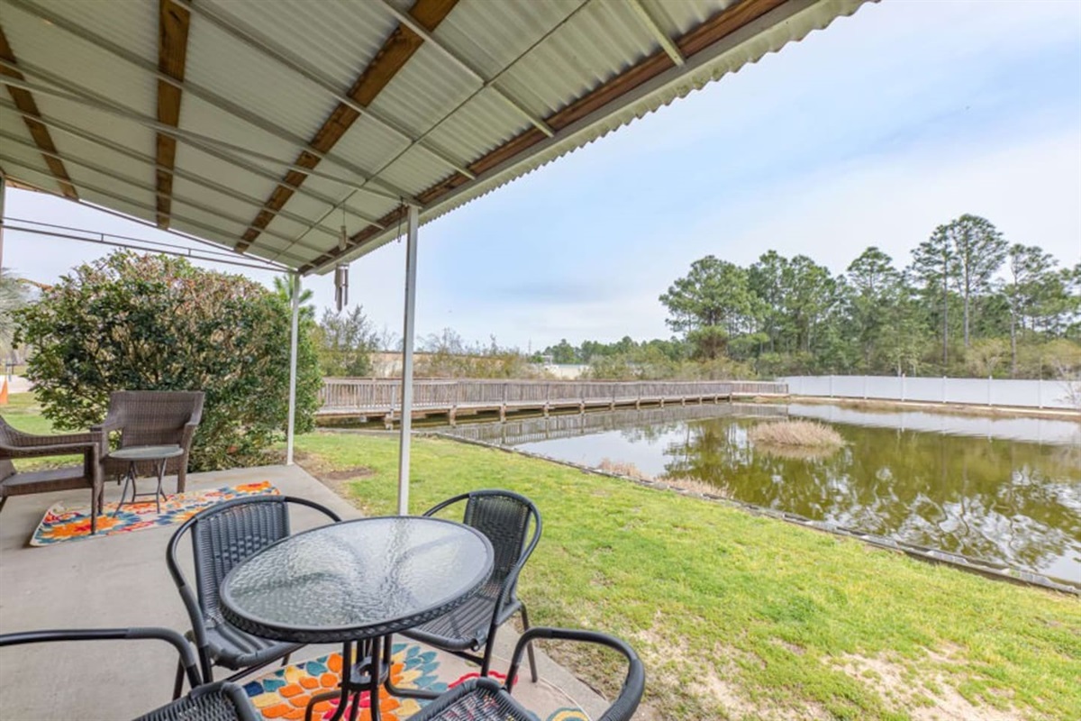 Patio Oasis: Sip morning coffee by the serene water view and lush greenery. Relax and unwind!