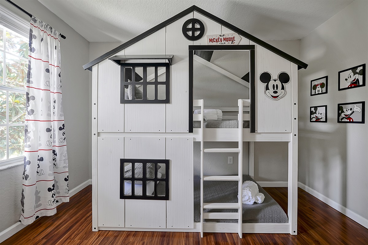 An easy to climb flat ladder leads little guests to the top bunk where they can peek through the window and feel safe and comfortable.