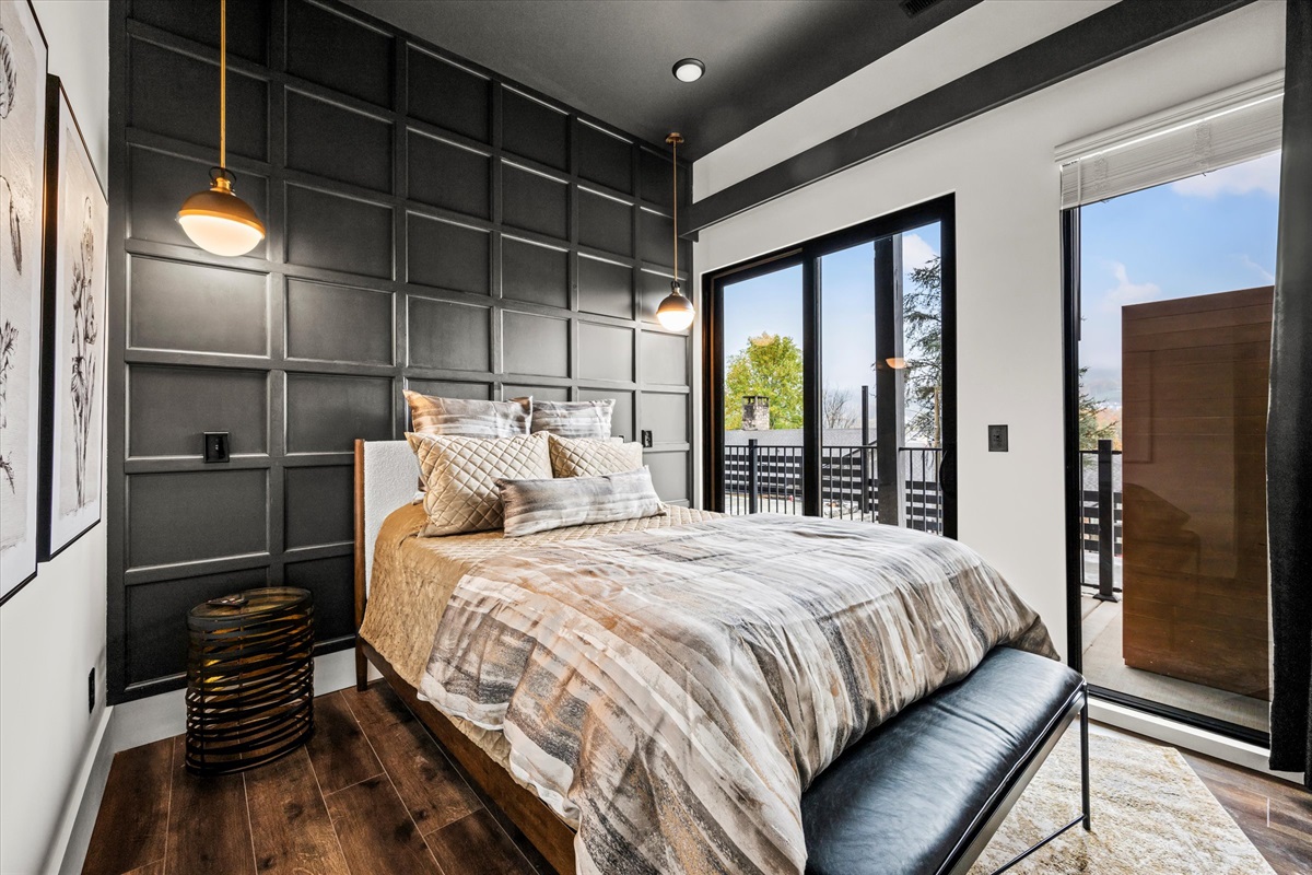 A Queen bedroom with high-end bedding for unmatched comfort.