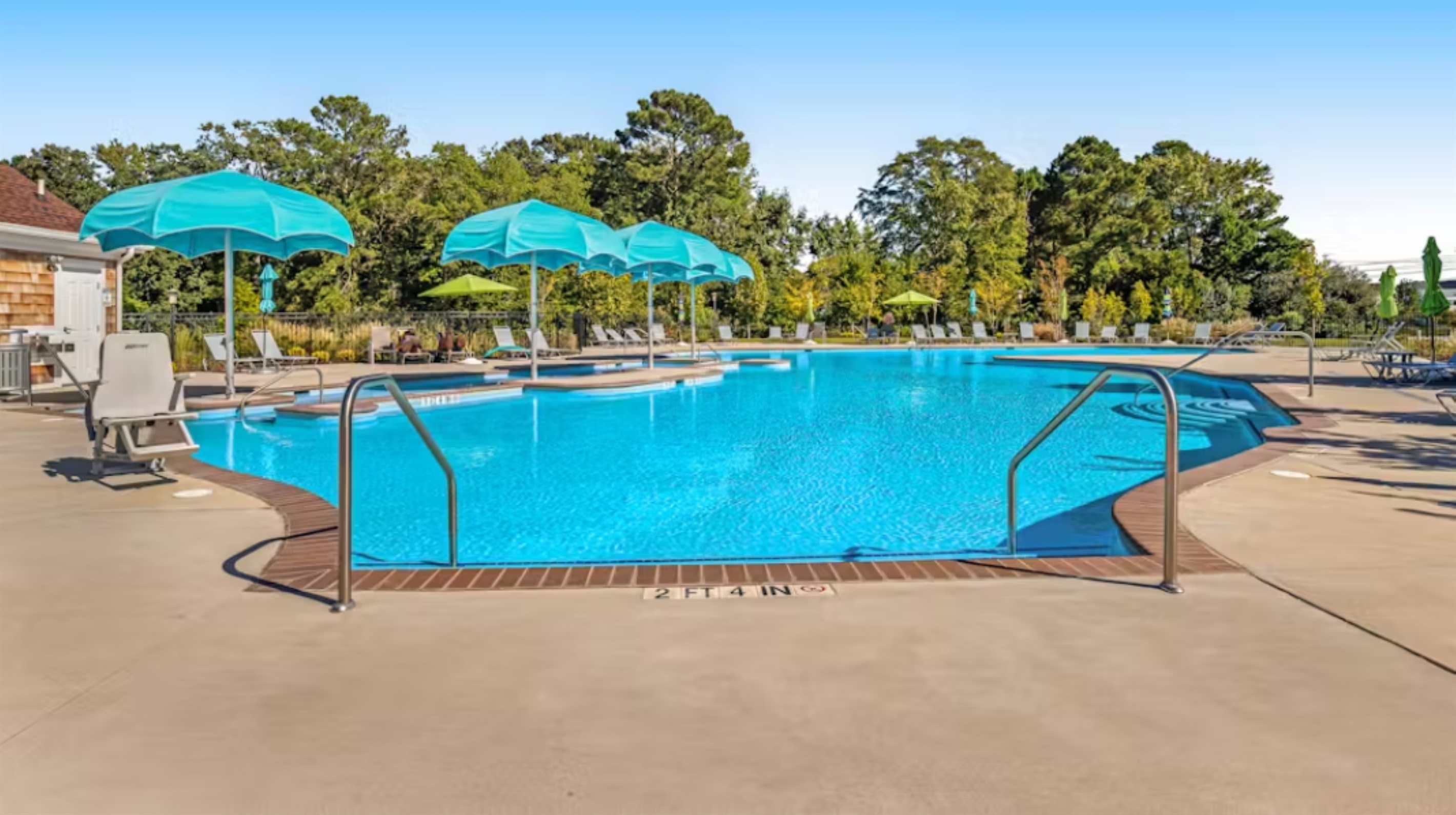 Clear view of depth indicators and wide entry steps, ensuring easy access and safe swimming.