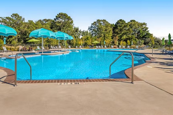 Clear view of depth indicators and wide entry steps, ensuring easy access and safe swimming.