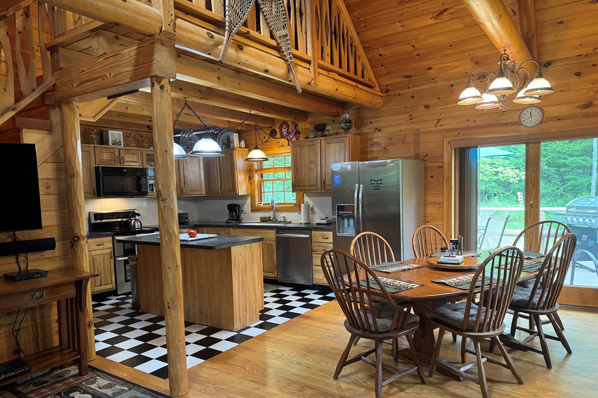 Kitchen and dining areas with easy access to rear deck