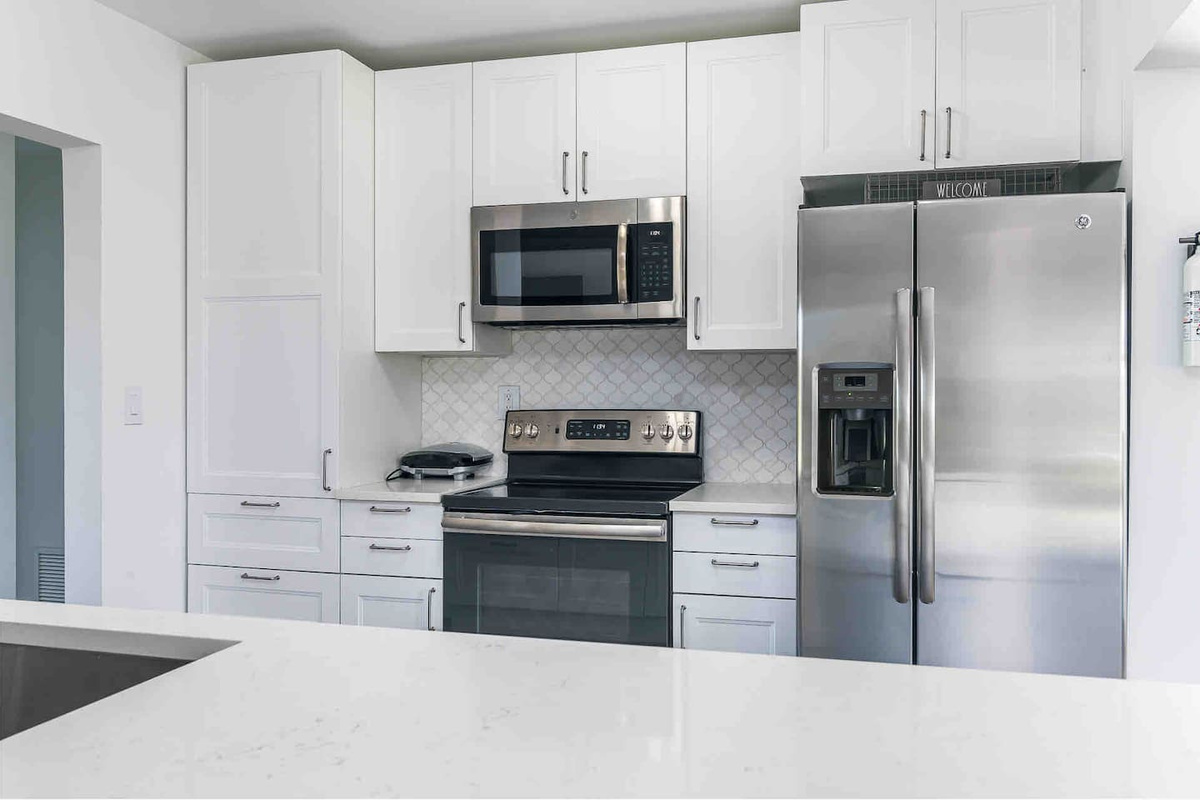 Self cleaning oven, glass top range and microwave. 