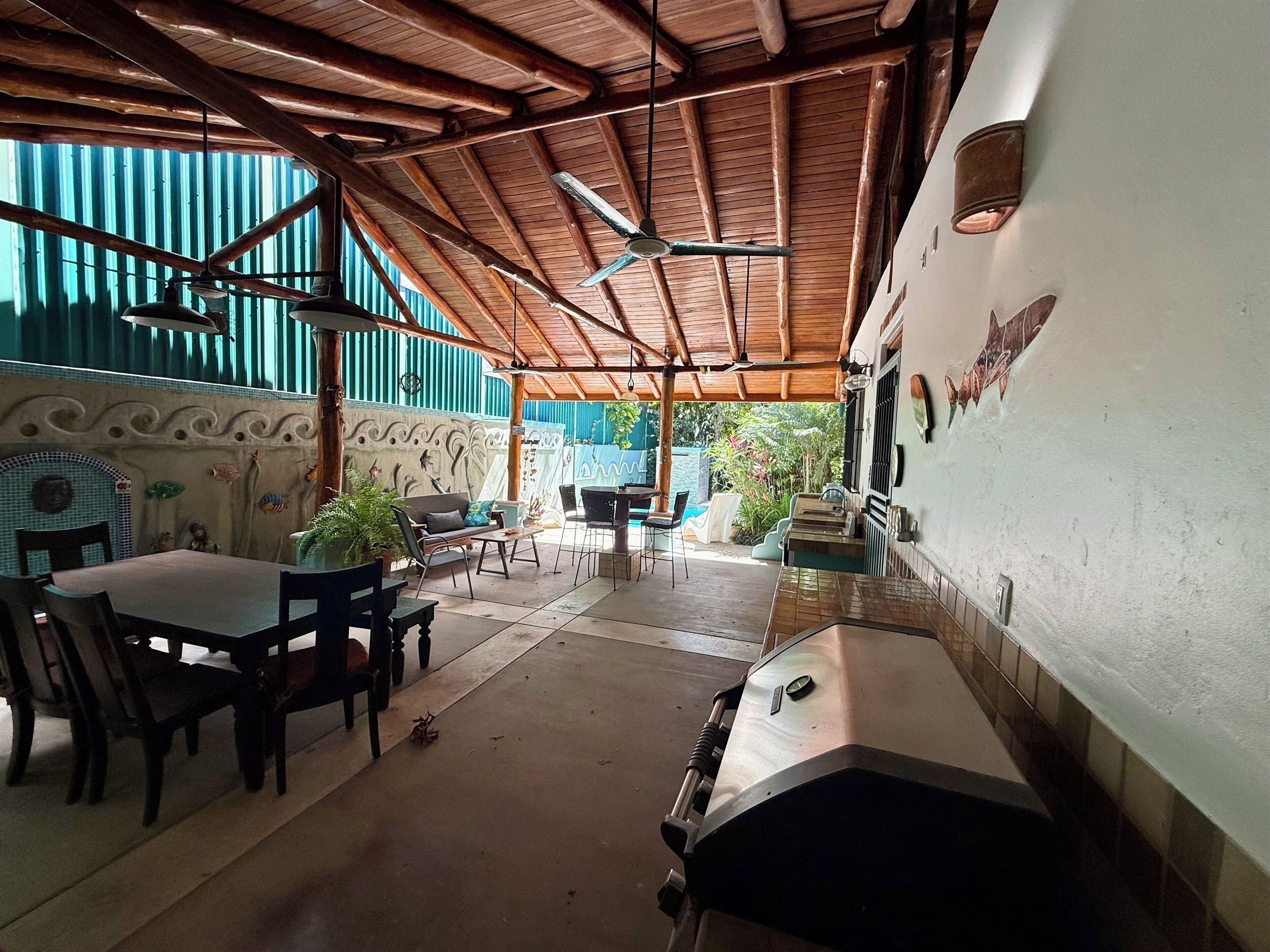 Large Rancho.  Outdoor dining table for 8 plus 4 person high top.  Gas grill 