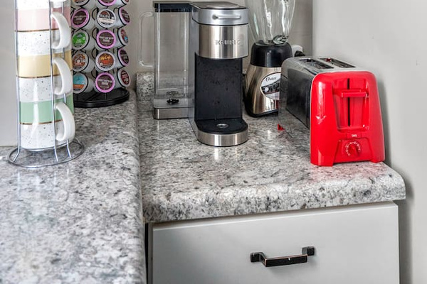 Discover our charming coffee nook, perfect for your morning brew or an afternoon pick-me-up.