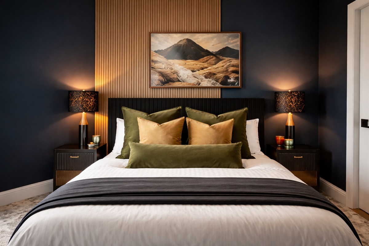 Bedroom 4 offers a private king retreat with its own ensuite bath — thoughtfully designed with rich wood accents, layered textures, and a calming feature wall. Fully complete and ready to welcome guests for a restful, elevated stay.