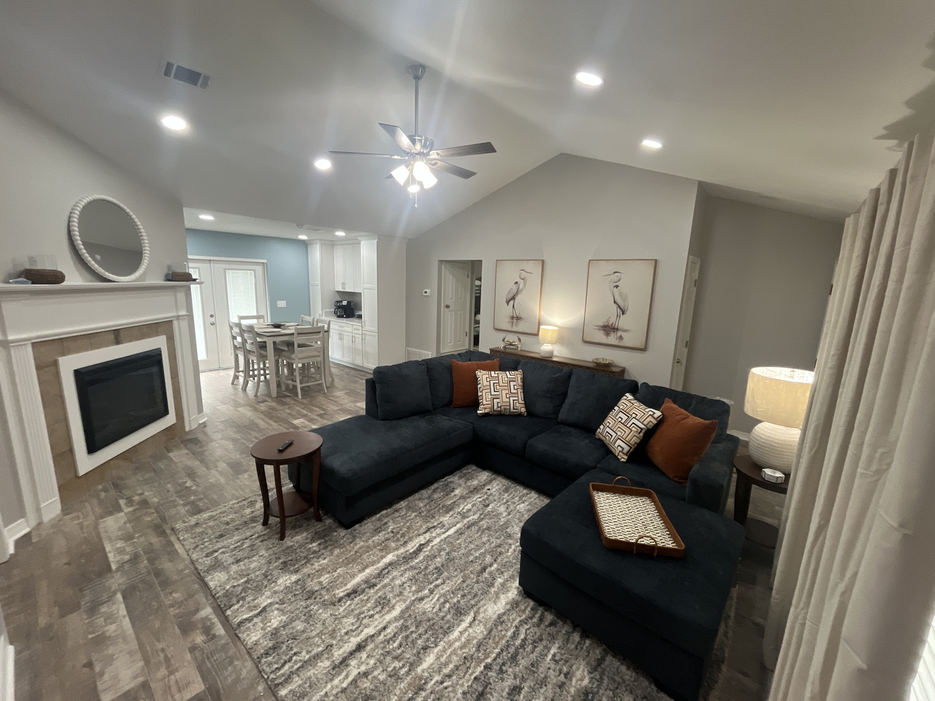 Spacious living room and dining area with access to the back deck area.