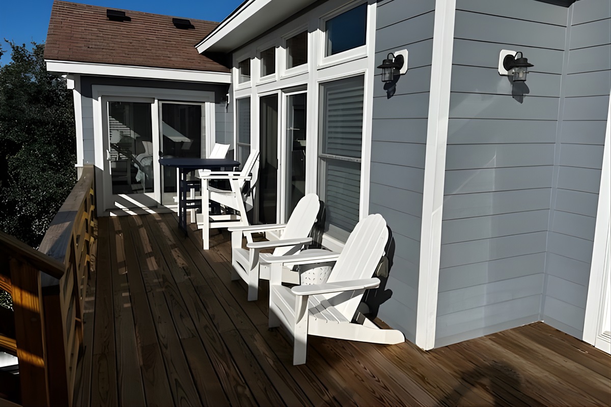 Top-Level back deck with table and seating