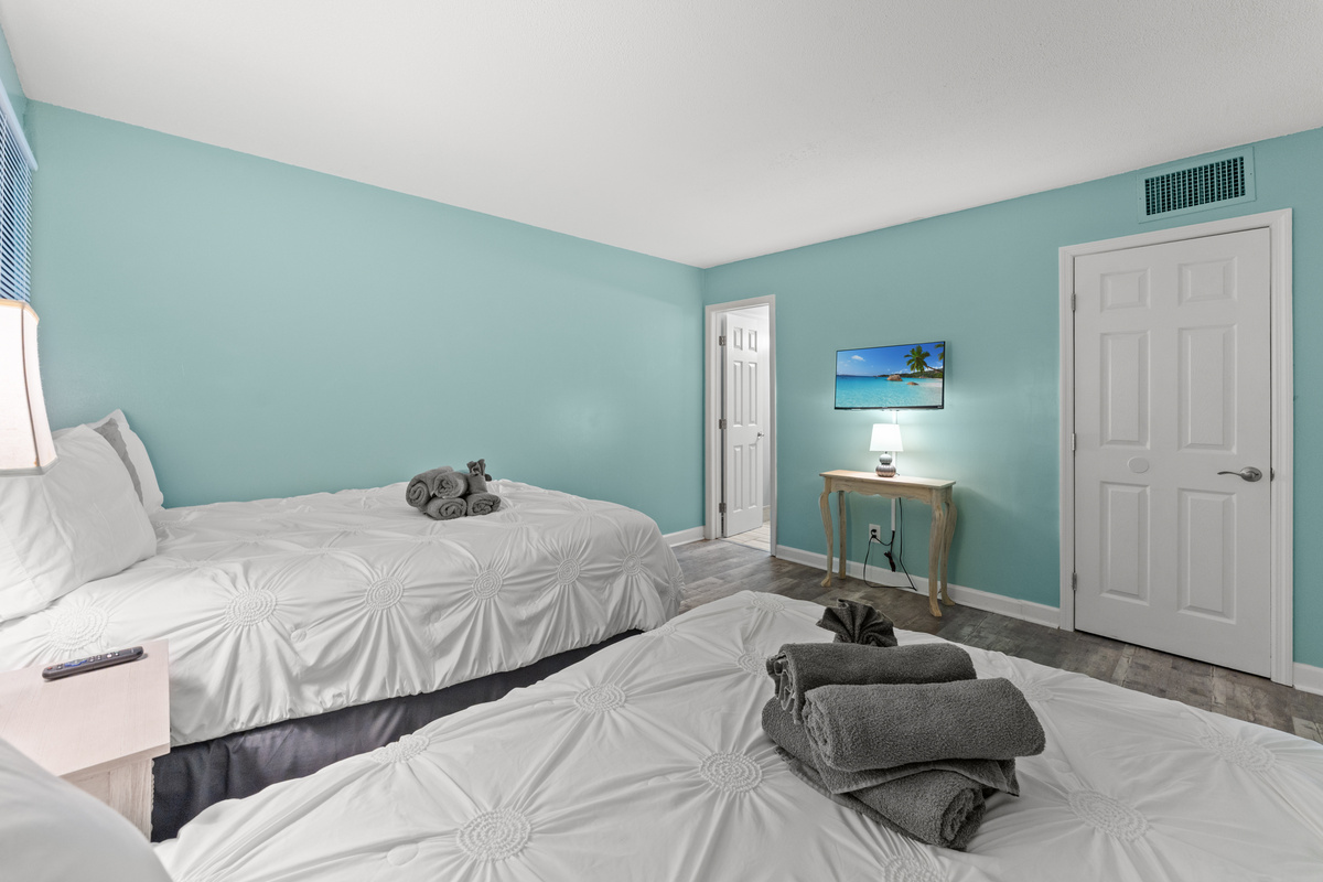 2nd Bedroom with a queen and double bed