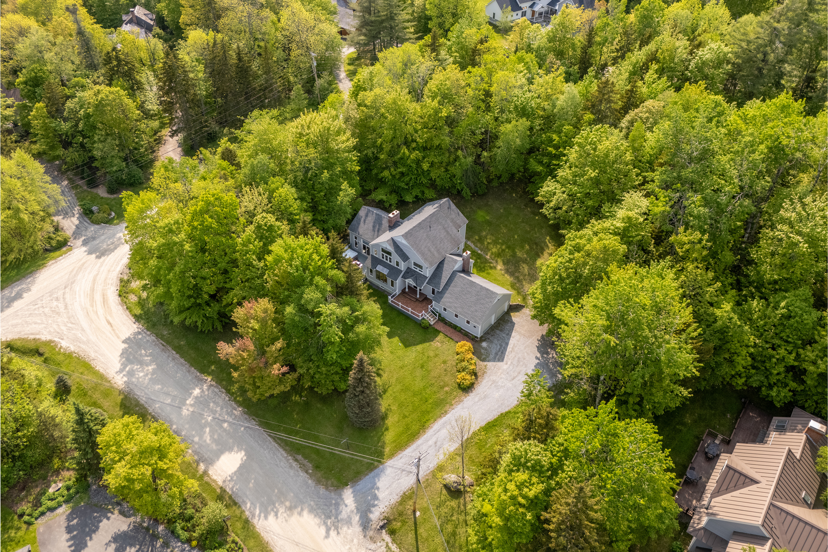 Aerial view of the High Meadow neighborhood surrounding this five-bedroom Stratton Mountain vacation rental