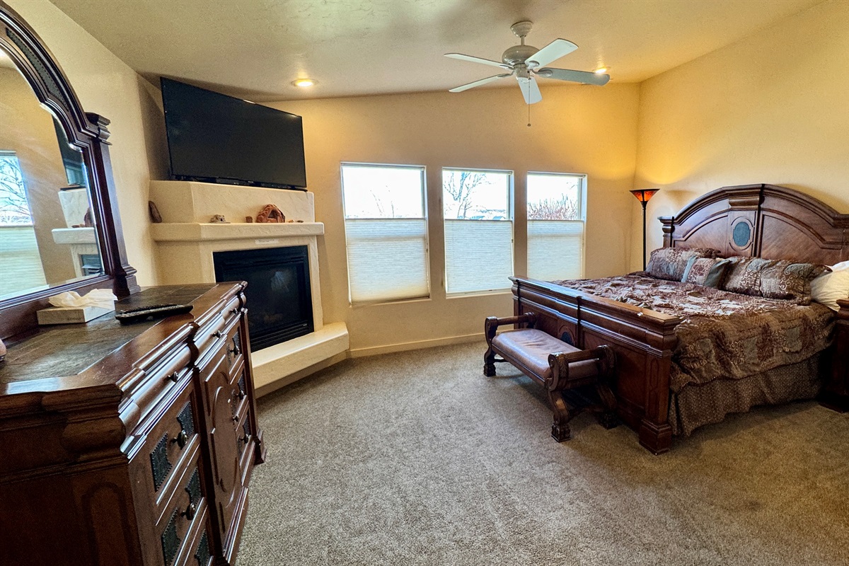 Primary Suite with King Bed and Fireplace