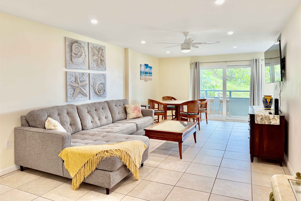 Enjoy the large living room with Smart TV and plenty of seating for movie nights