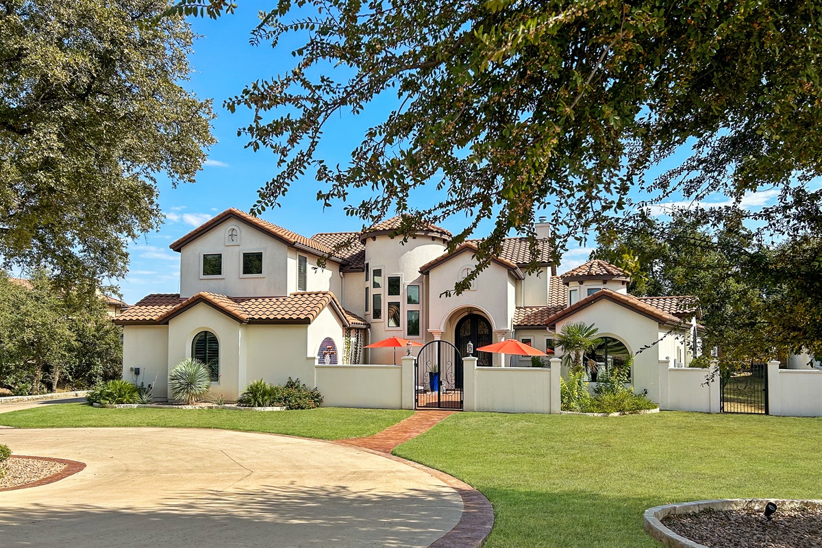First impressions matter! Our front entrance showcases the timeless allure of Spanish-style design with a beautiful tile roof. Come explore!