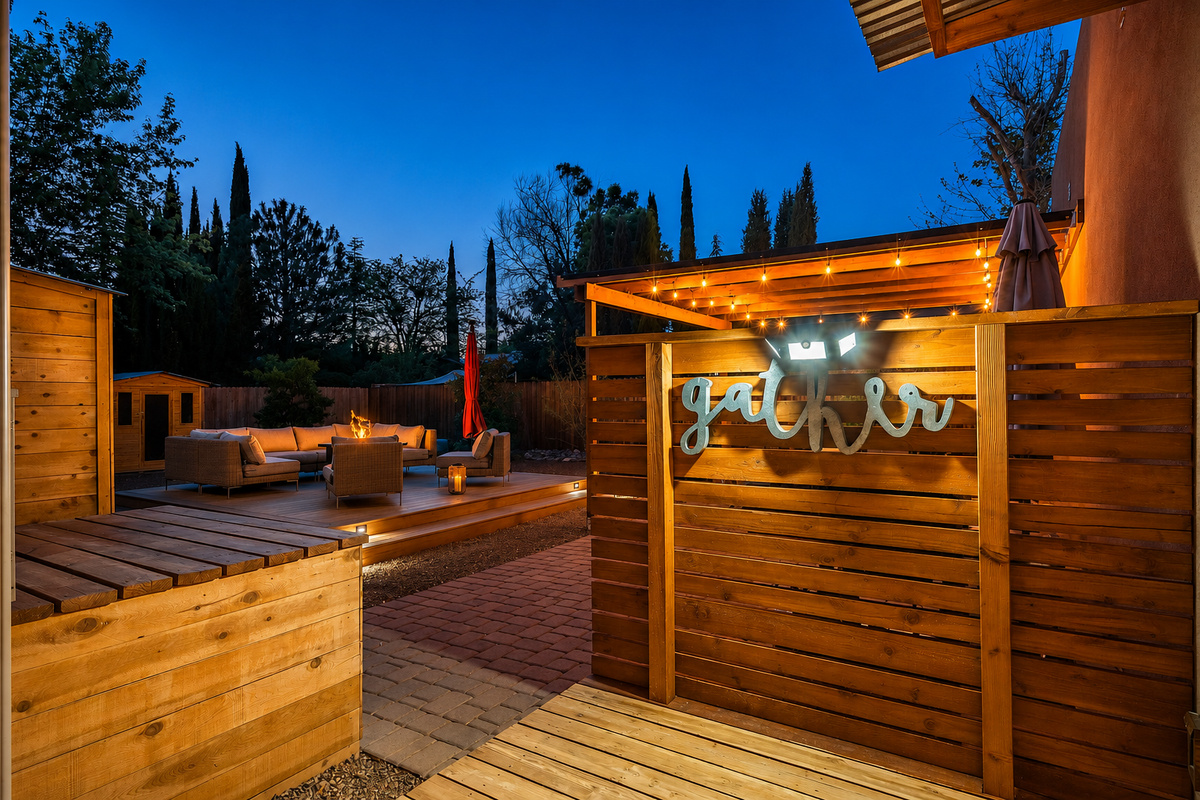{Outdoor Lounge} Cozy backyard retreat with a fire pit, ambient string lights, and inviting seating made for gathering under the stars.