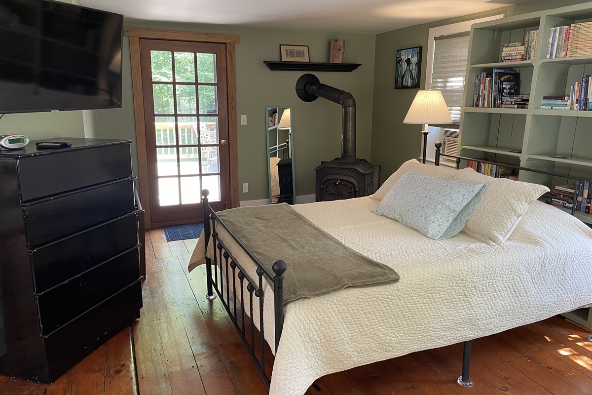 1st Floor Queen Bedroom - access to the side porch.