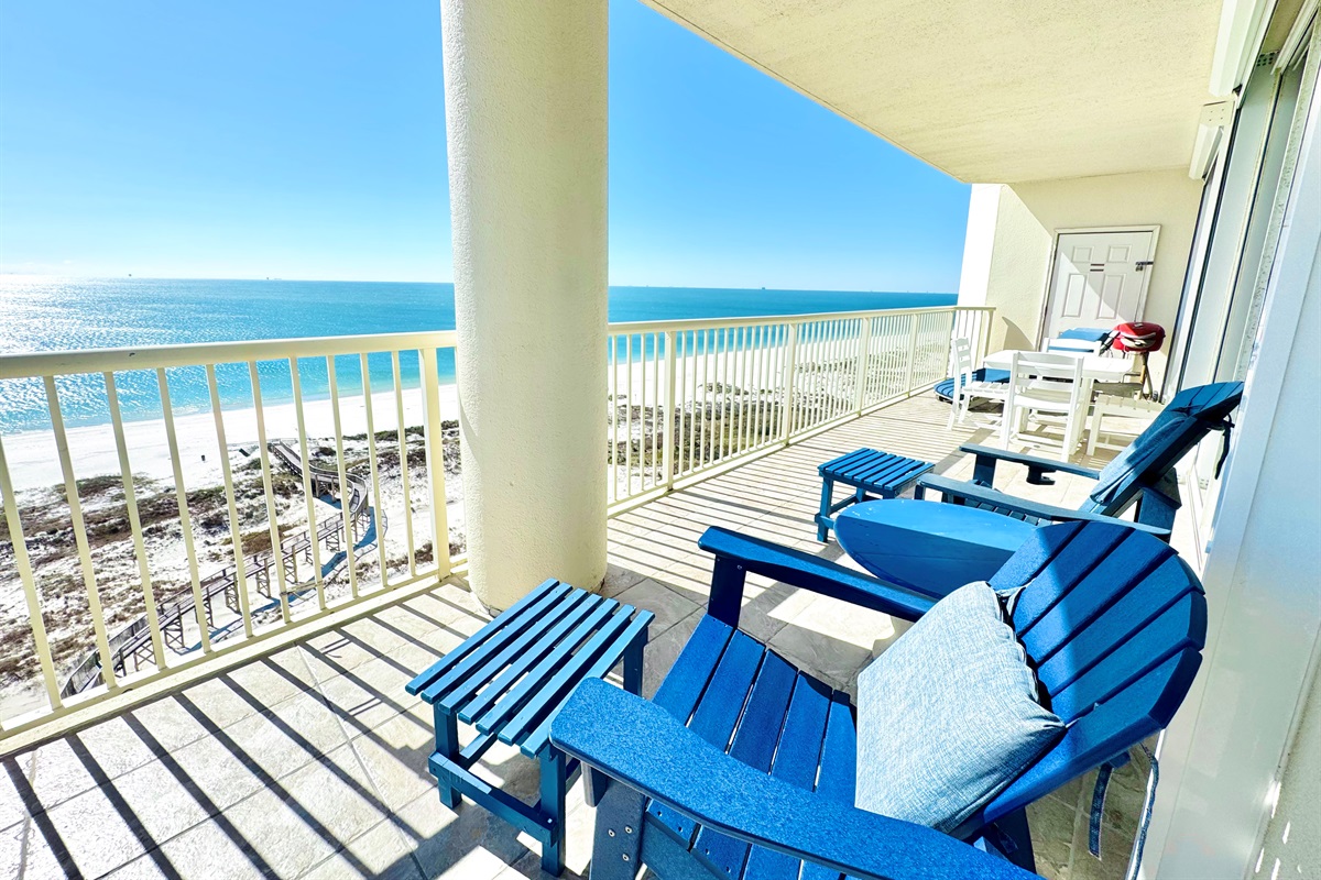 Balcony has plenty of furniture, so everyone can enjoy the view!