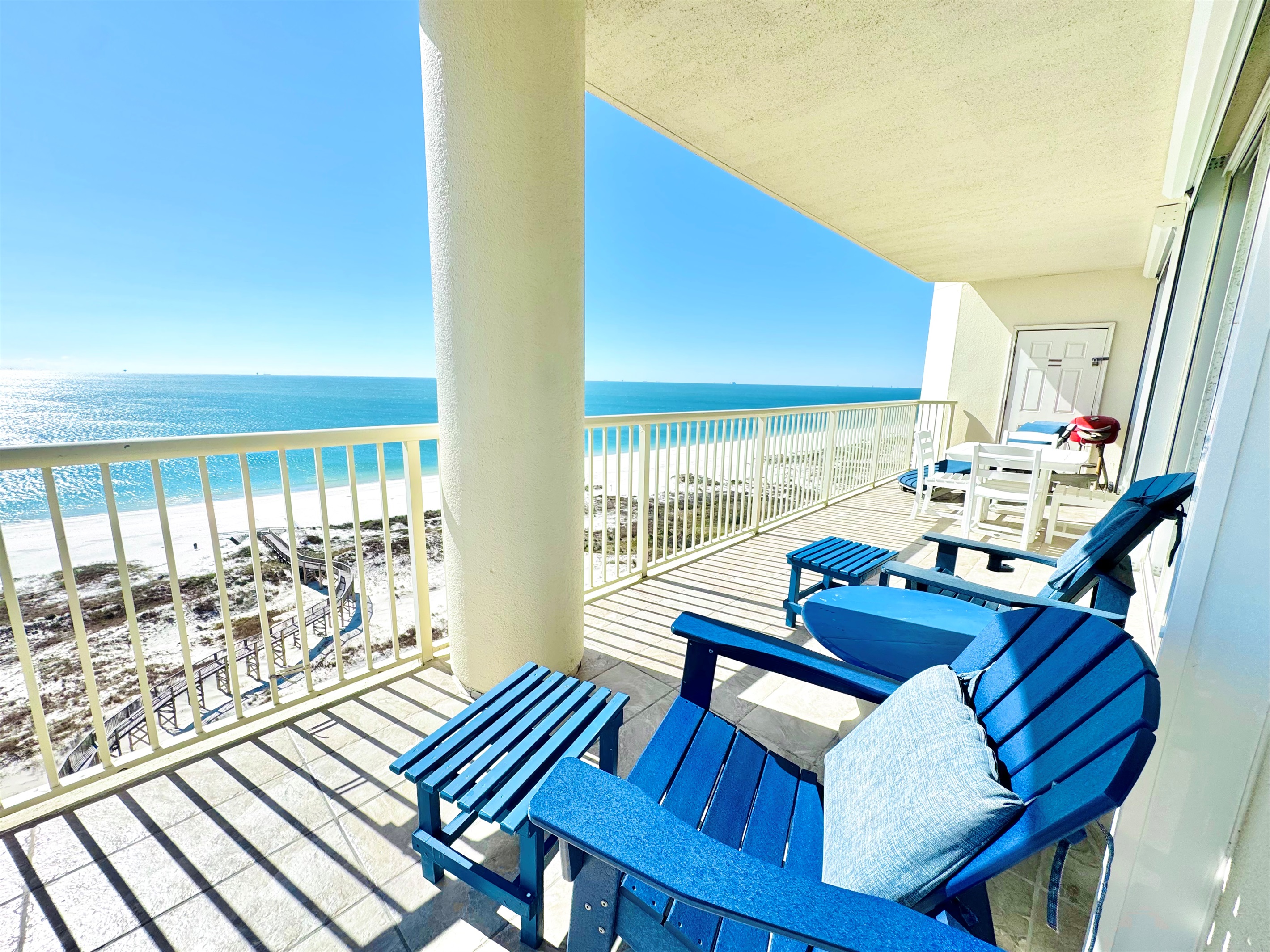 Balcony has plenty of furniture, so everyone can enjoy the view!