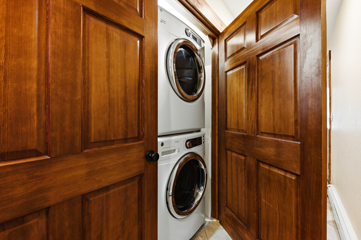 Full-size washer and dryer closet on lower level