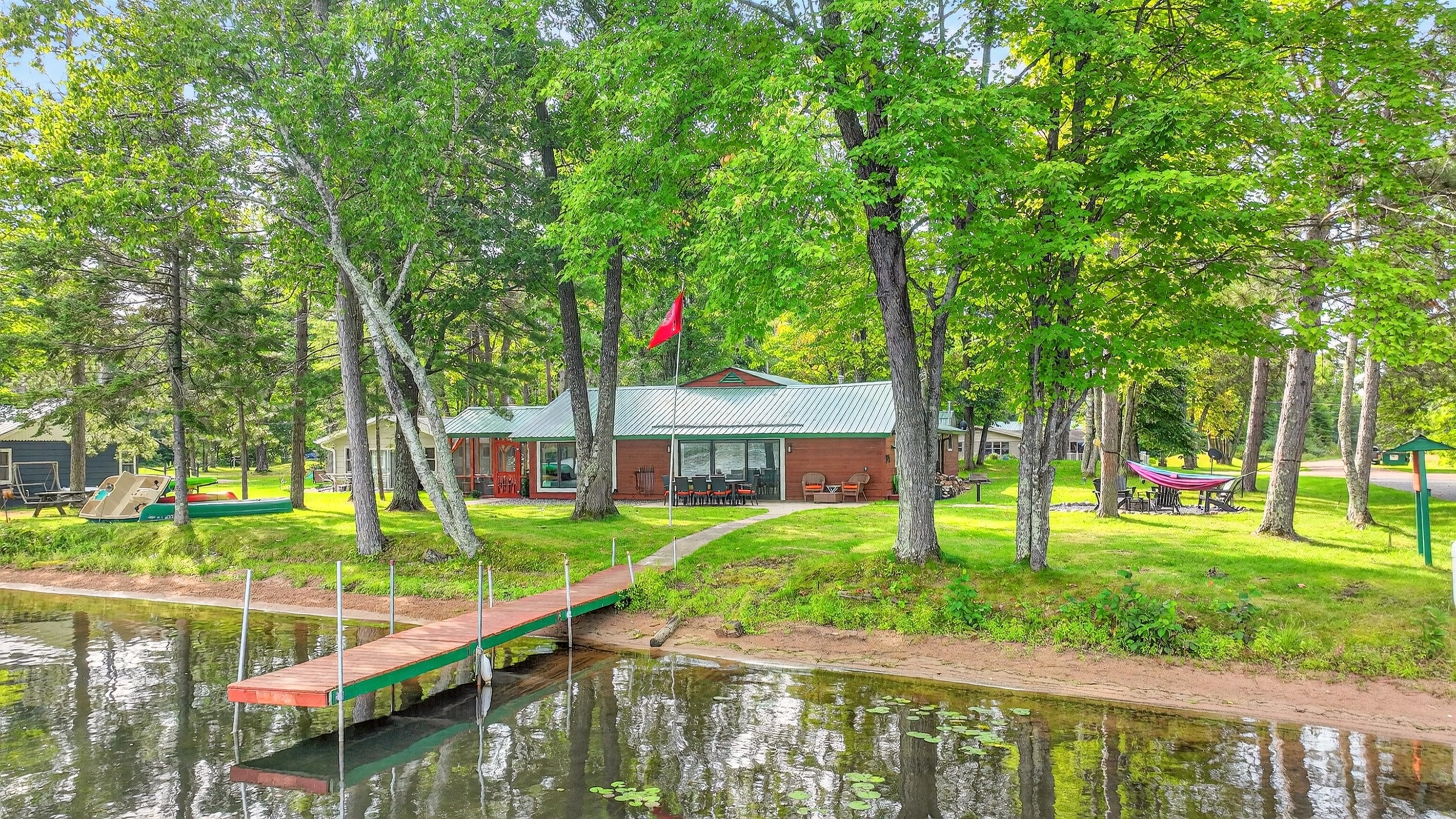 The kid-friendly shoreline has a gentle, sandy entry - perfect for wading and water play. Bring your boat - private dock space is available, and we are directly next to the public launch for easy access.