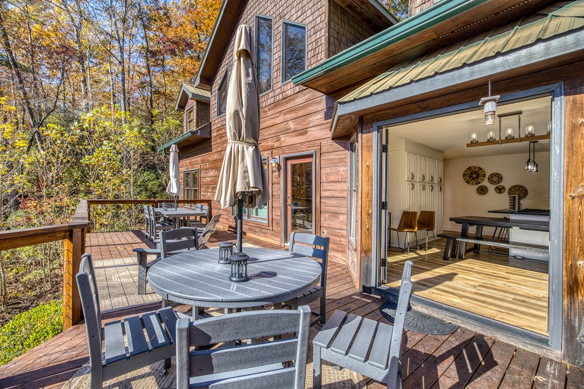 Outdoor tables seat 10, with two extra adirondack chairs. 
