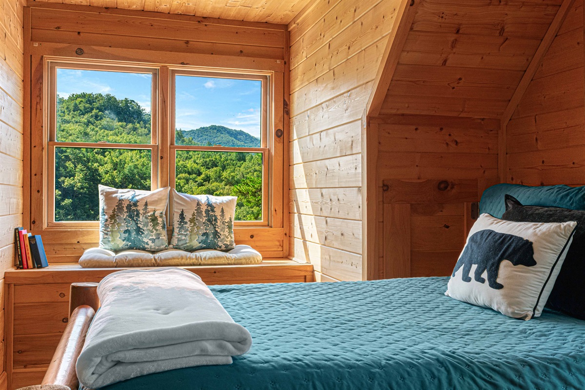 Upstairs Bedroom 2: Nature views from the window seat invite relaxation and adventure!
