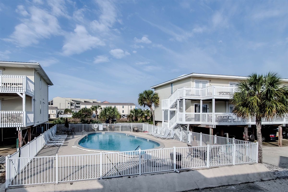 Outdoor Communal Pool - The large outdoor pool is a very inviting space for a hot, summer day. Whether you choose to enjoy laying out in the sun or floating in the water, the pool is there for you to enjoy.