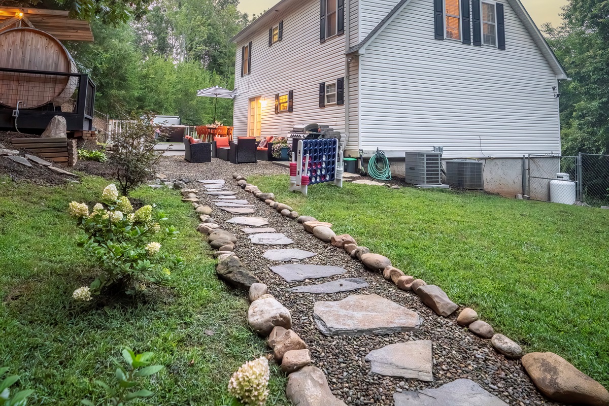 🔥 Stone path to the firepit = cozy vibes, zero muddy feet! ✨🌙