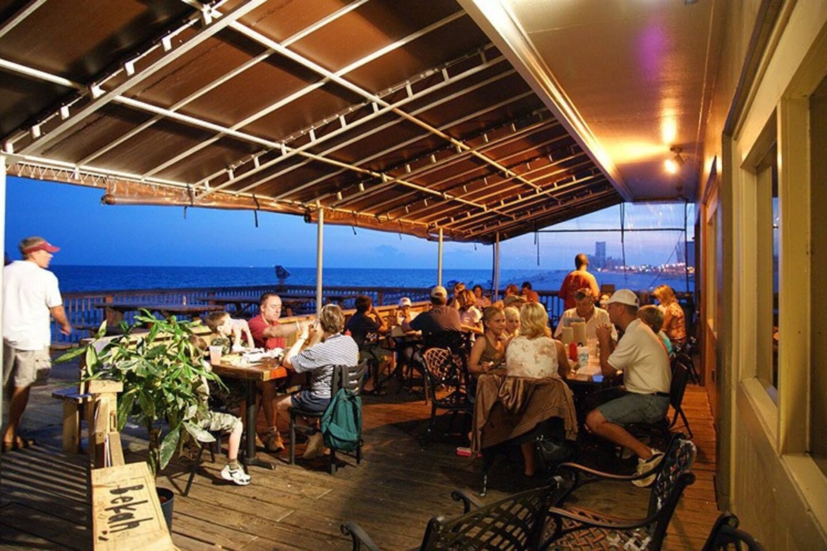 Sea N Suds Located on the property.  Enjoy drinks and dinner directly on the beach!