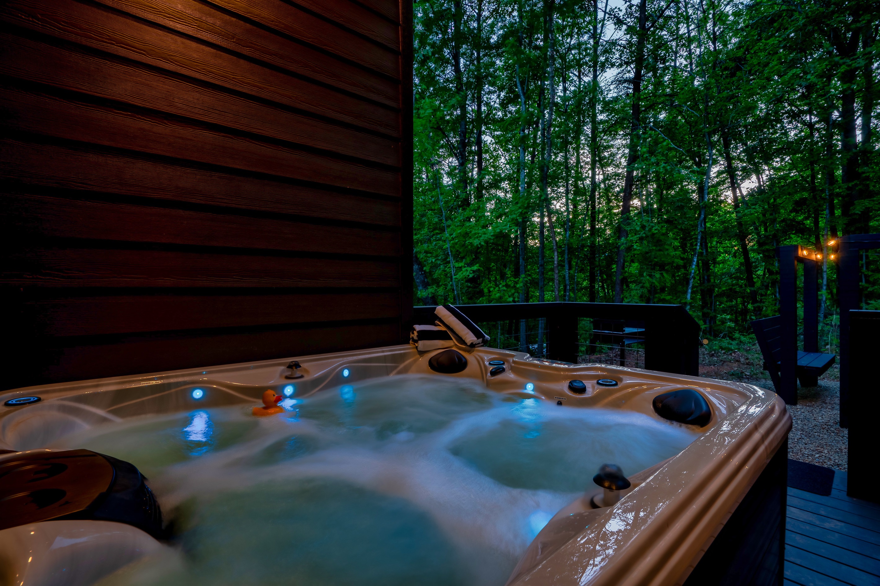 Soak in the smoky mountain air at the cabin in the Hot tub 