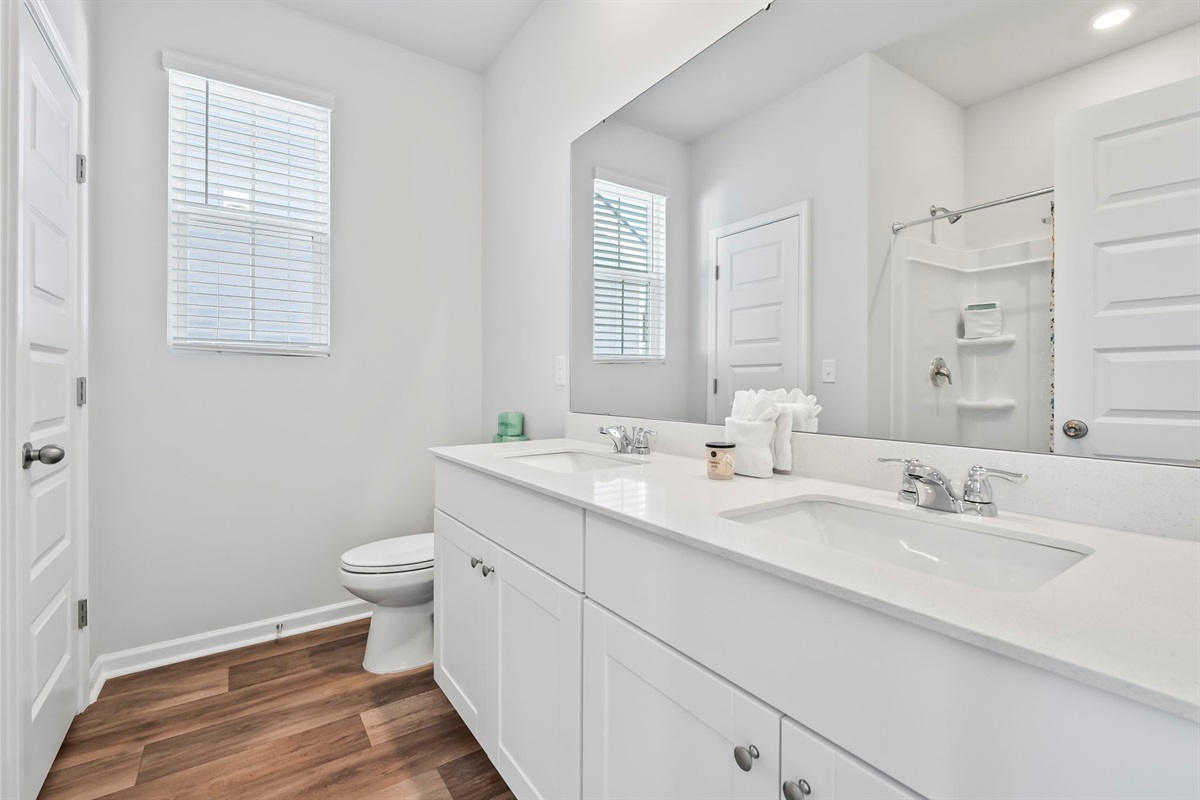 Ensuite bathroom with dual vanities