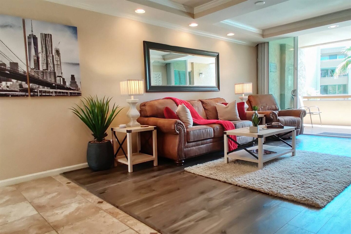 Relaxing living room includes queen sleeper sofa with memory foam mattress.