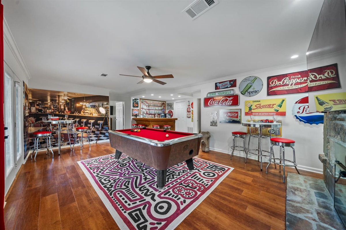 The Antique Pool Table is the Highlight of the Game Room and a Guest Favorite!