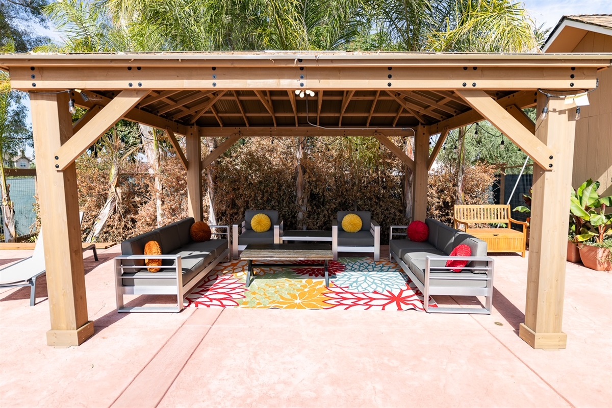 Our new pool, BBQ, fire table, and gazebo.