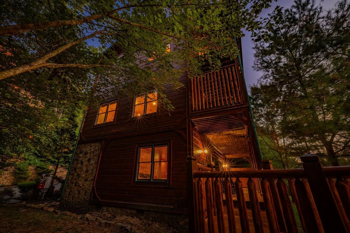 Multi-level covered decks with rocking chairs on every floor. Mountain views from every level of this 5-bedroom Gatlinburg cabin. Sleeps 12.
