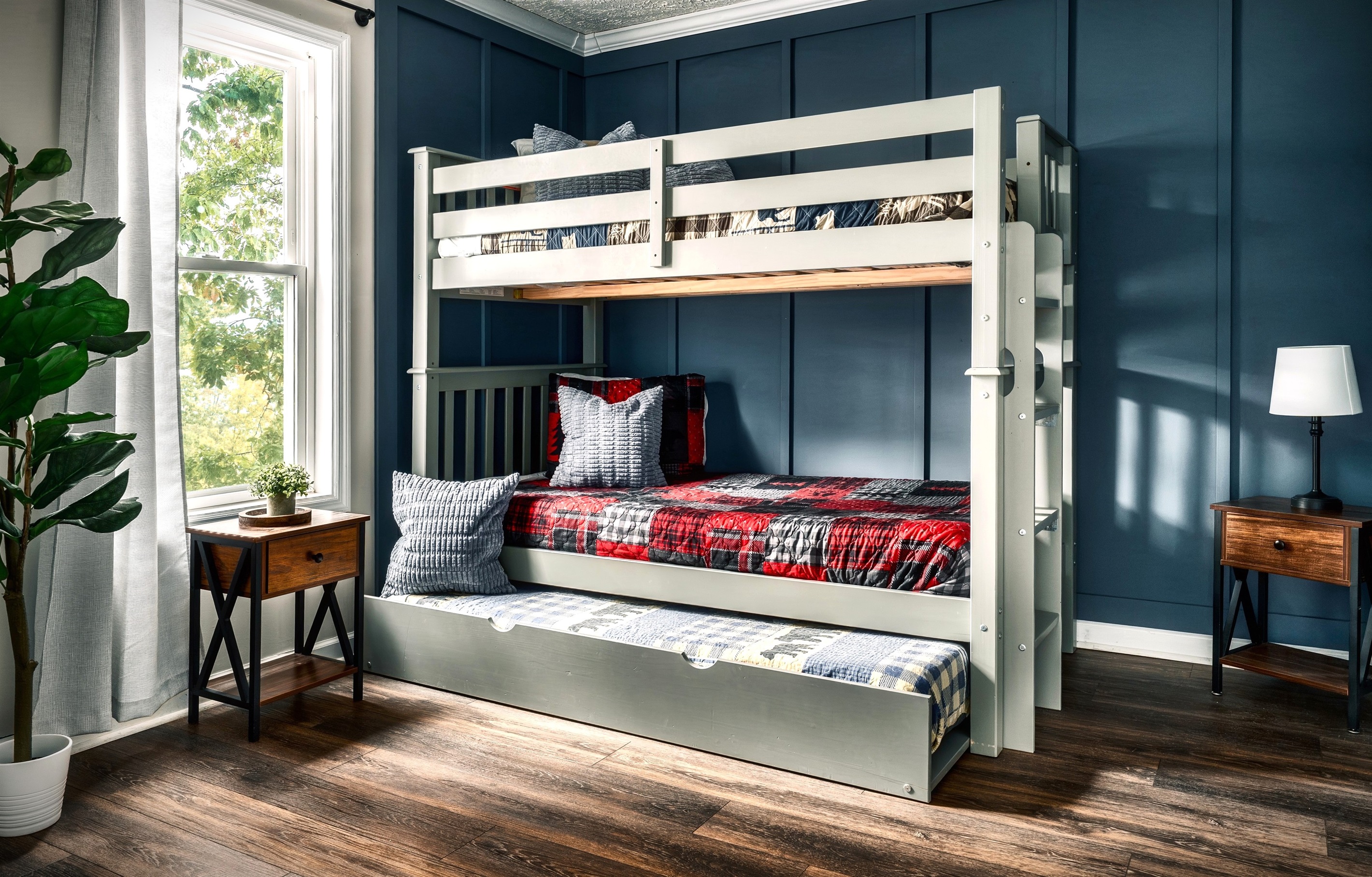 Wake up and enjoy that sunshine along with that fresh and crisp mountain air. This is the secondary bedroom in the main floor. Twin size bunk bed with a trundle - Sleeps 3.