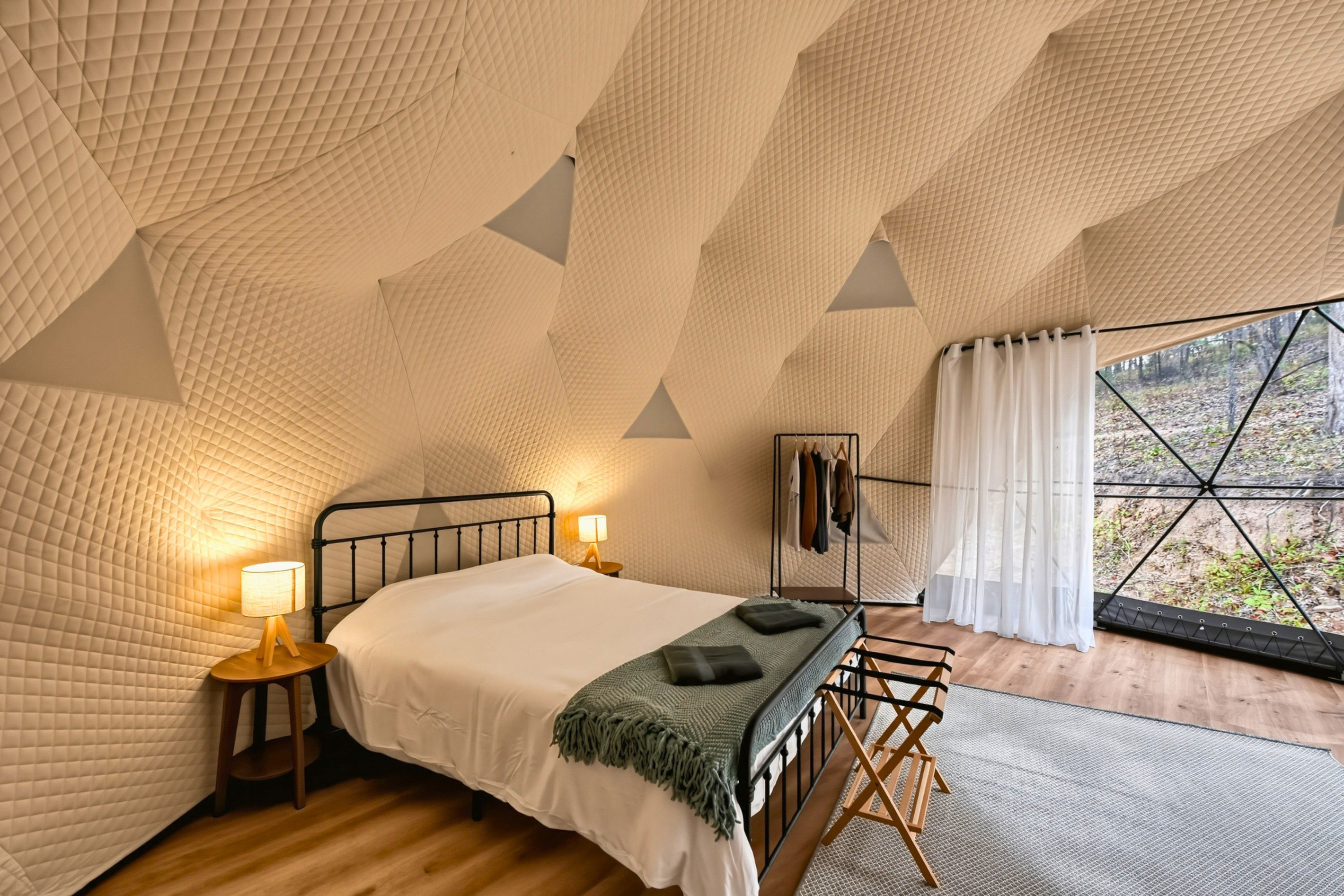Settle into the comfortable queen bed and enjoy the natural light from the dome’s window.