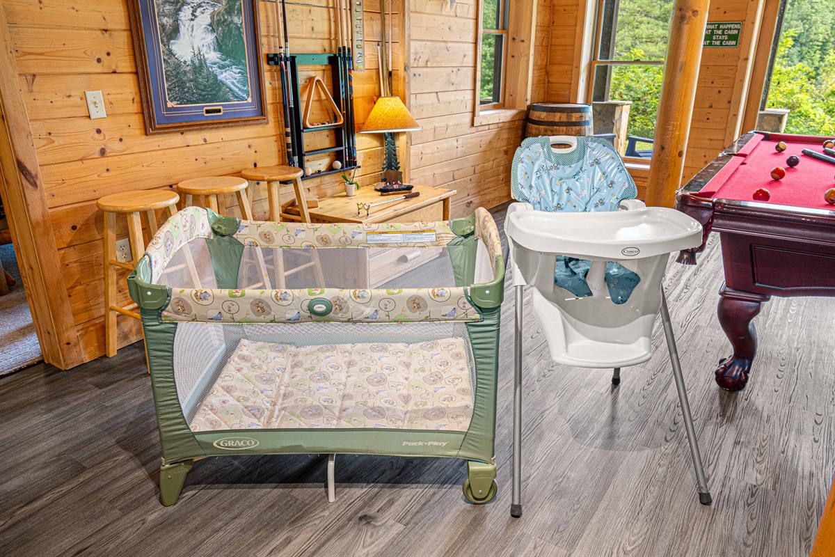 Downstairs Game Room:  Family fun awaits with a pool table and kid-friendly amenities!