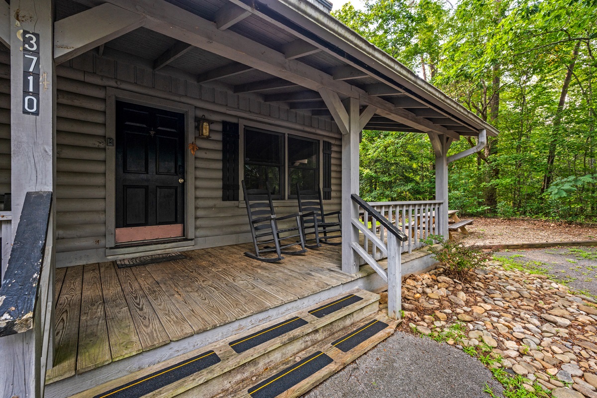 Dog-friendly mountain retreat: enjoy relaxing mornings on the front porch.