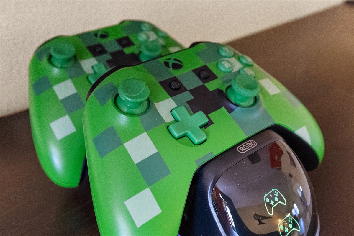 Xbox One with wireless, rechargeable Minecraft controllers and movie and game library.