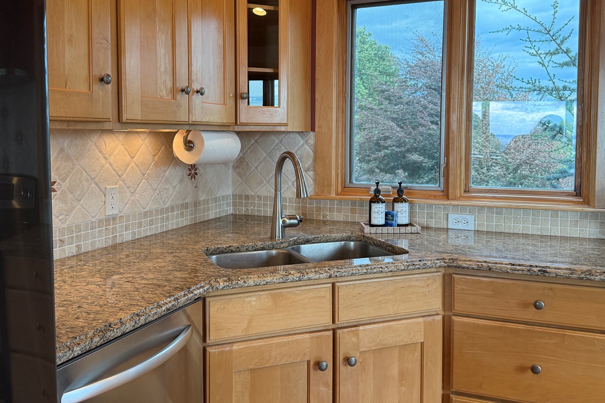 Catch the northern views as you clean up dishes at the kitchen sink. Views surround your at the Sweetwater Confluence.