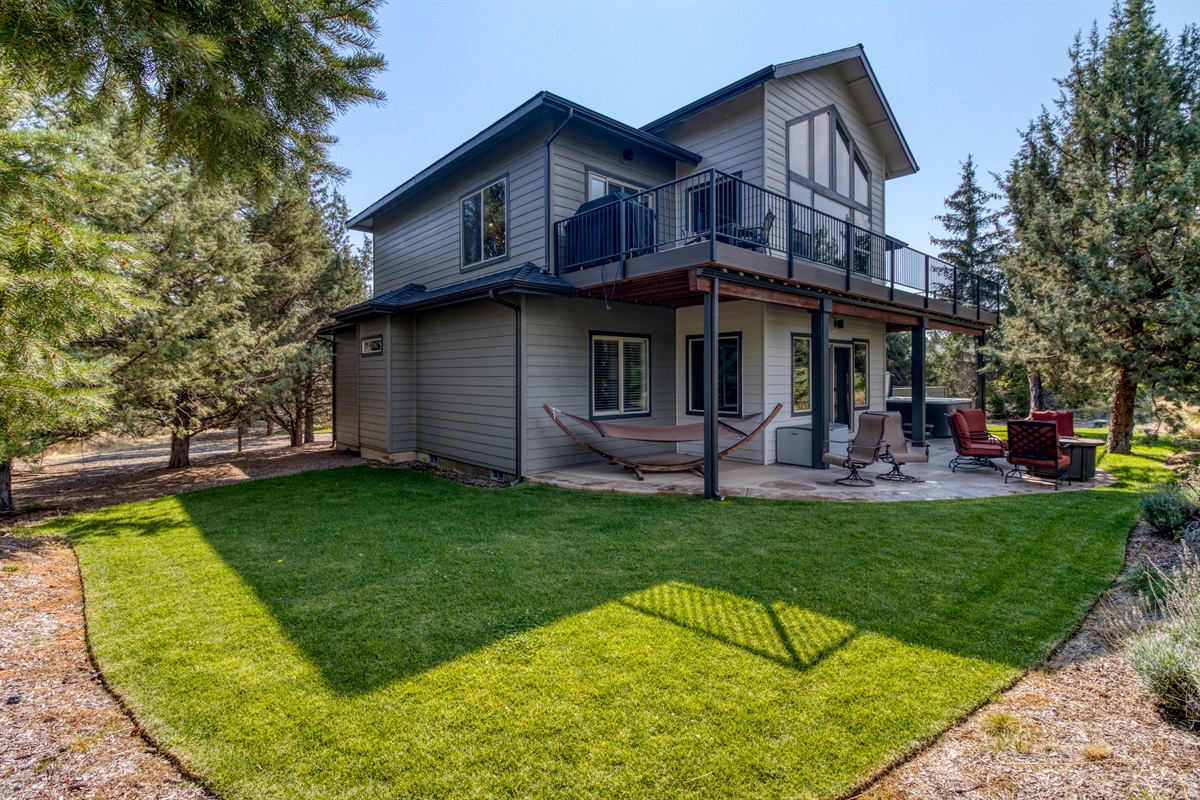 Large grass yard for the kiddos to play.